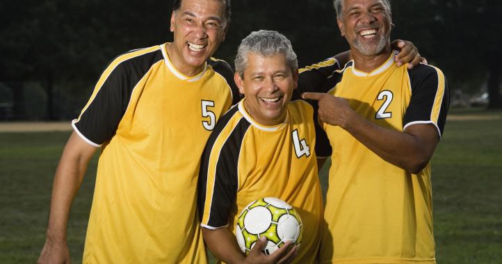 Men with soccer ball, Local Sport Defibrillator Grant Program